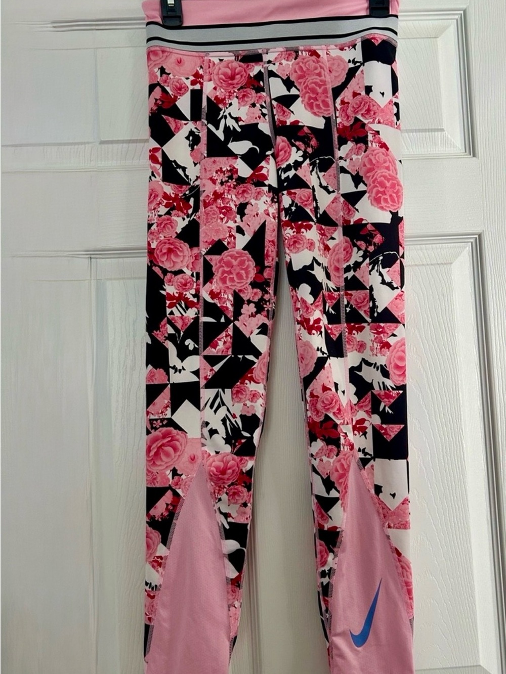 Nike Girls Pink Floral Geometric Leggings with Blue Swoosh